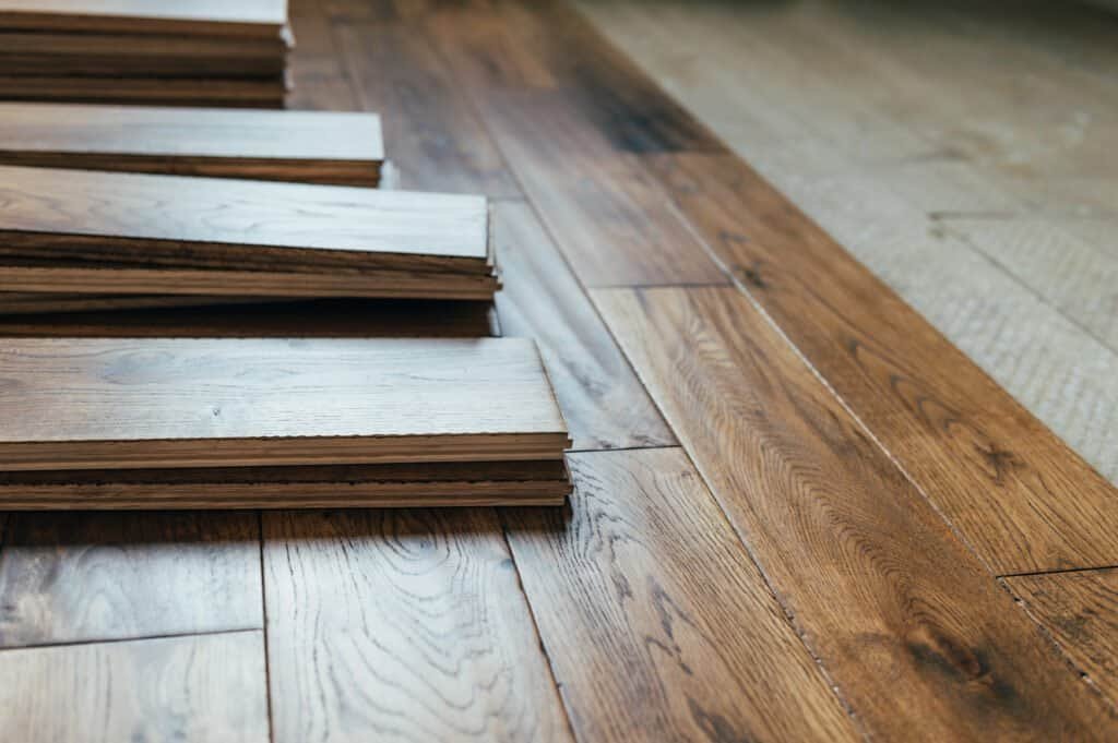 Natural hardwood flooring samples and finished oak wood floors showcasing craftsmanship.